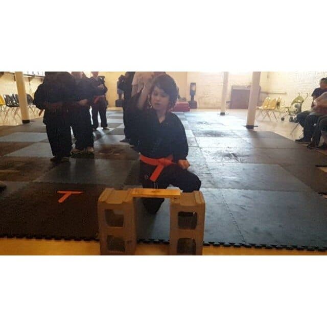 Check out Elliott's Martial Art's Promotion: Breaking Board's and Pushing Through Obstacles